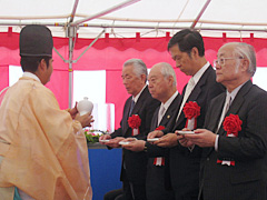 Drinking sacred sake.