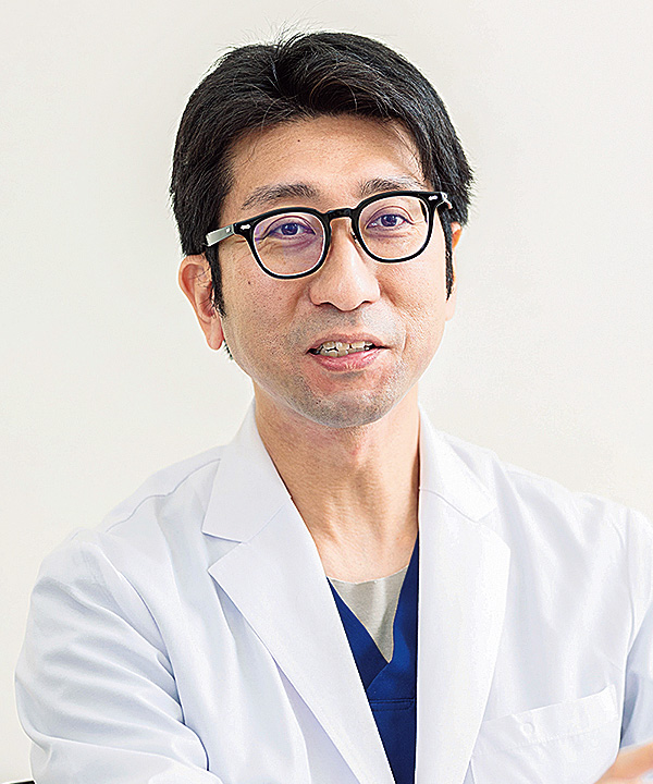 矢富 謙治